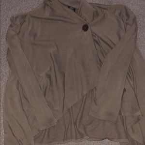 Poncho type sweater with button